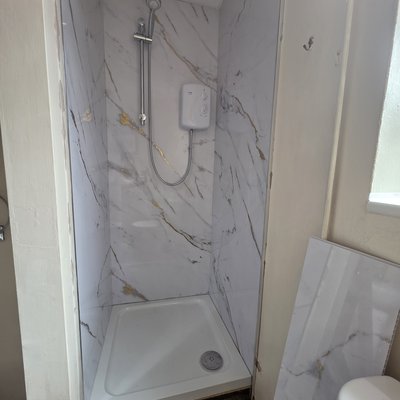 Replaced shower cubicle