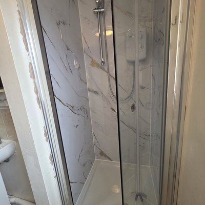 Replaced shower cubicle