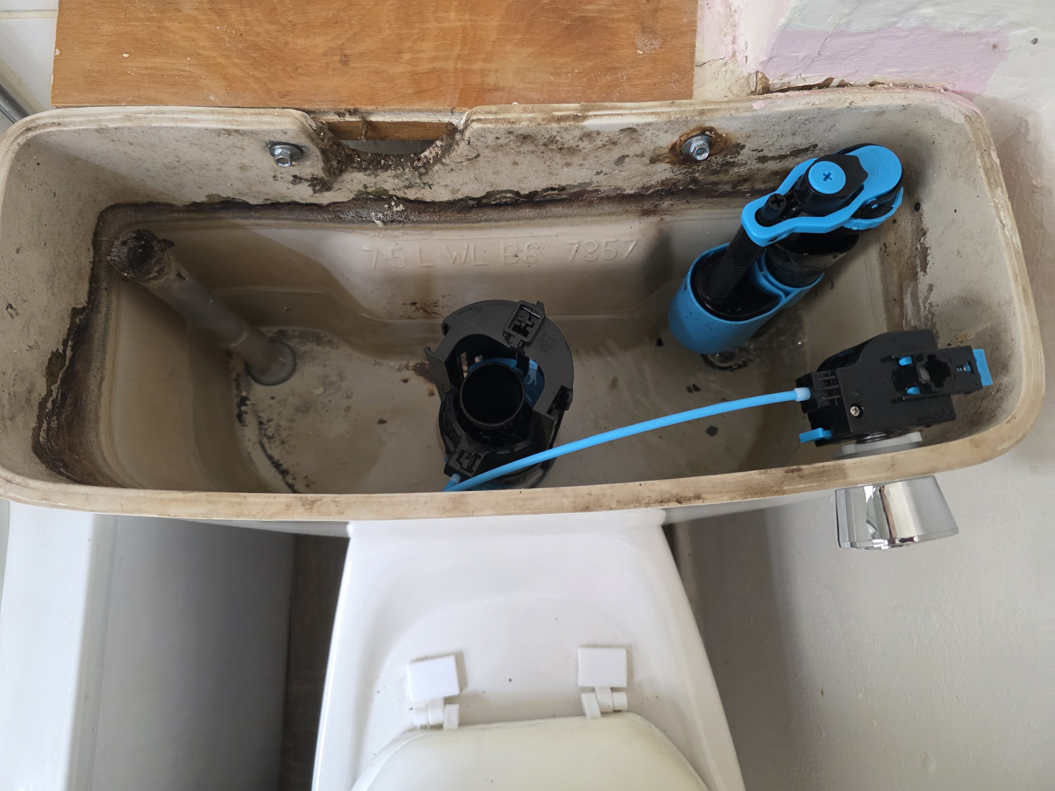 Traditional toilet parts replaced with modern cistern valves
