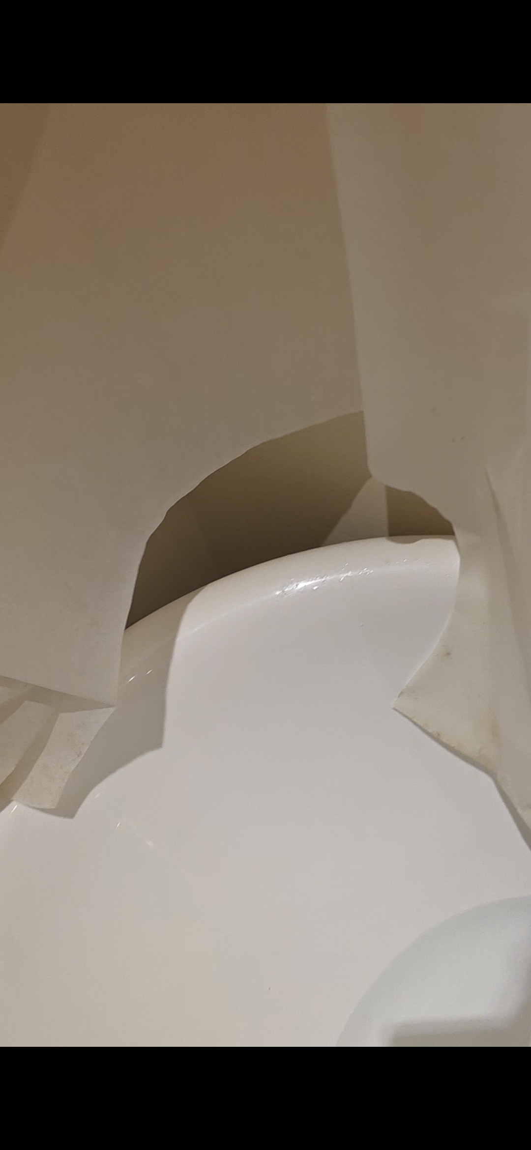 Toilet waste fitting clearance behind a pan