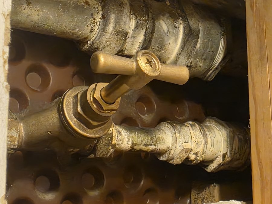 Traditional internal stop tap in a cupboard