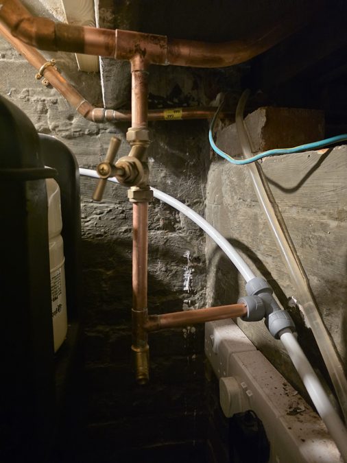 Internal stop tap on bypass pipework in an under sink cupboard
