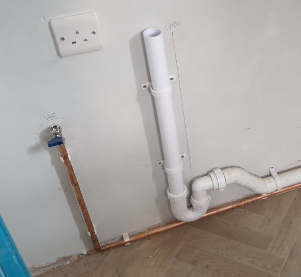 Washing machine plumbing, including, waching machine tap, up-stand trap and pipework
